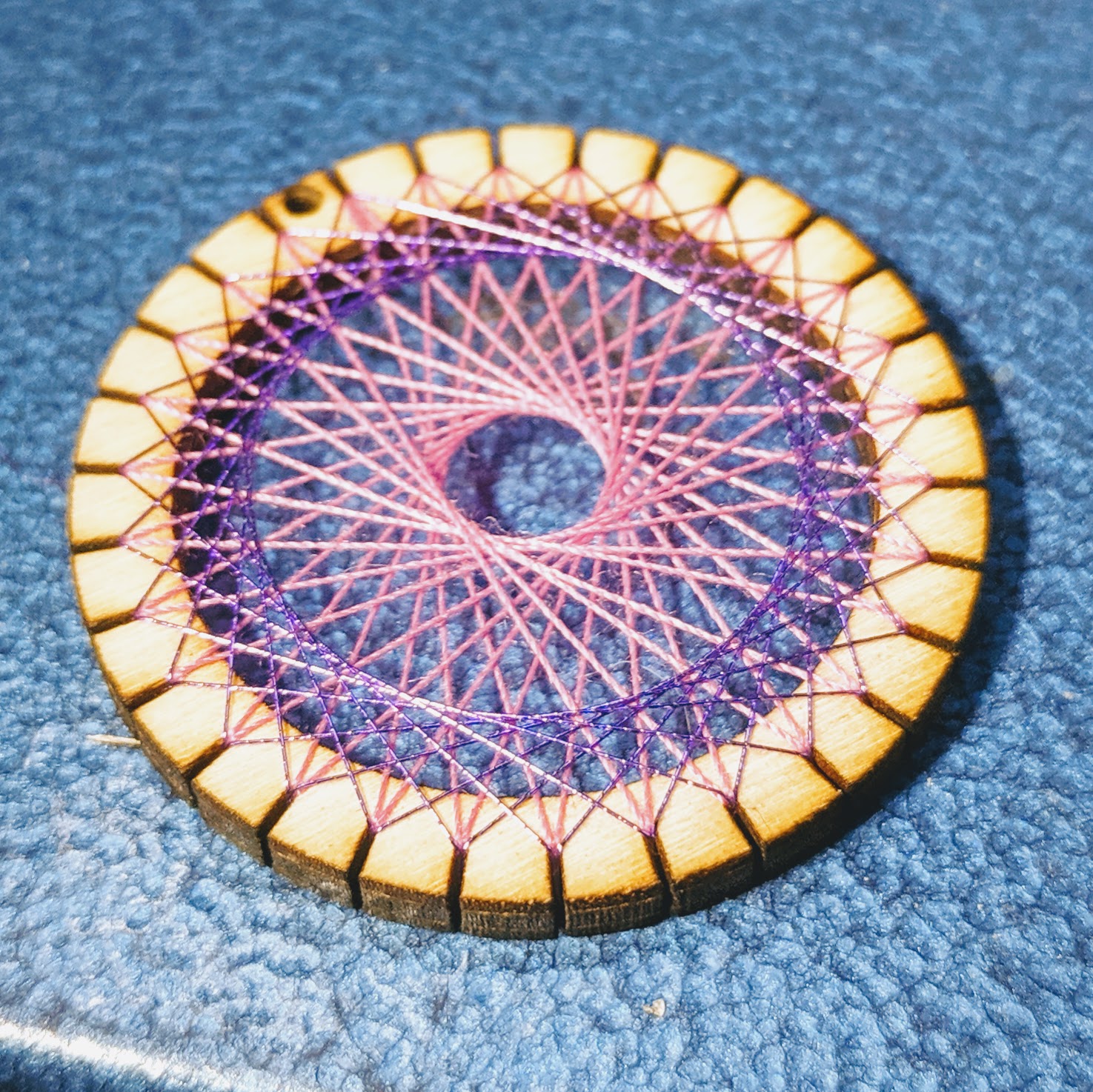wood and string pendant